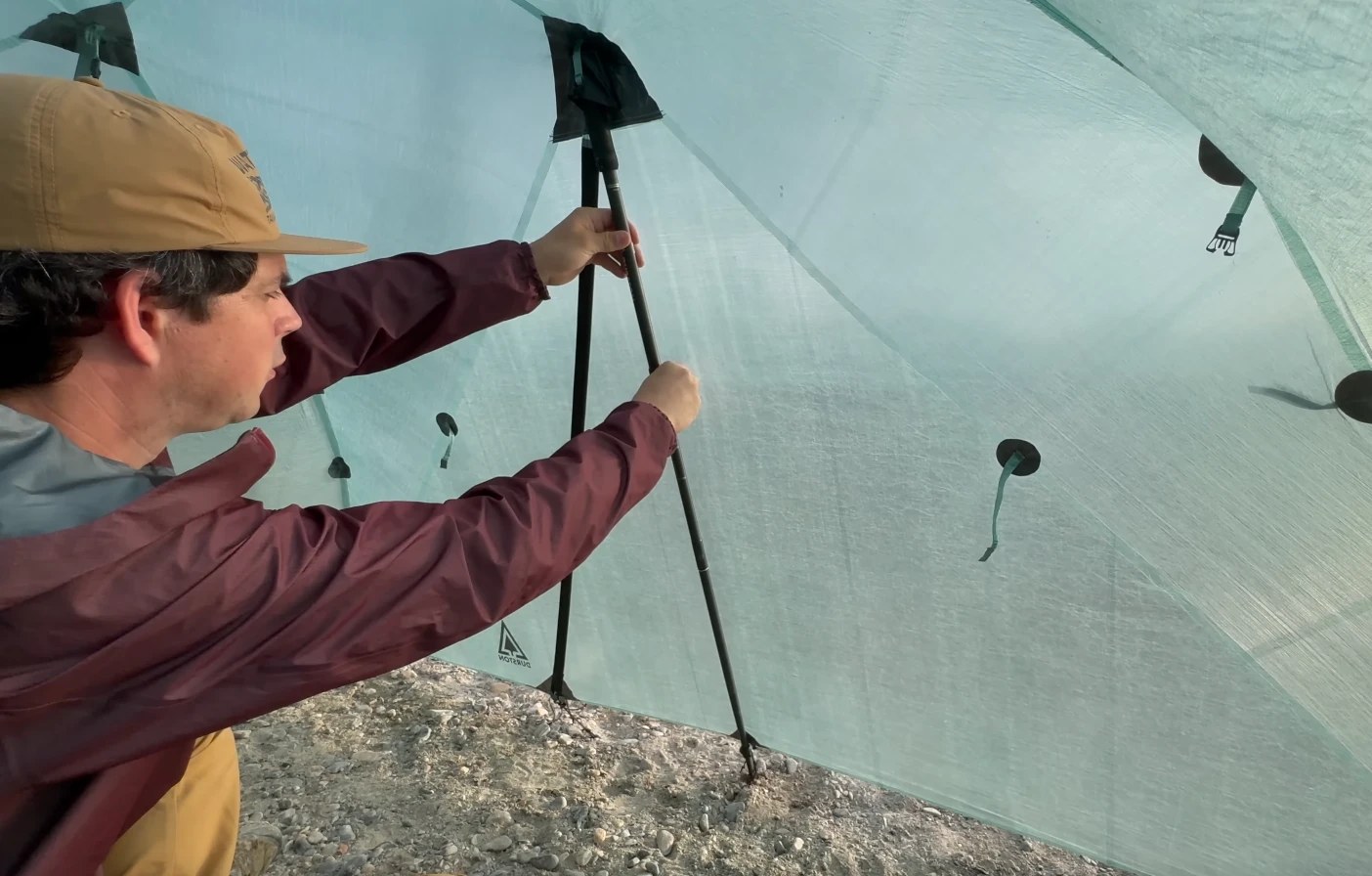 The sleeve near the outer door allows you to install a hiking pole for extra stability